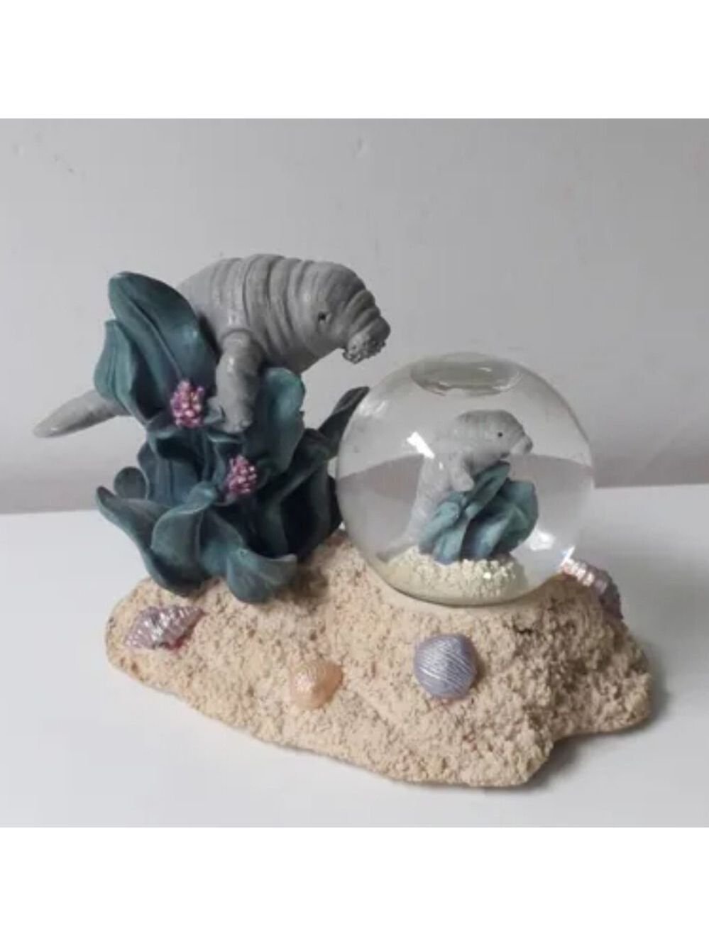 NWT Lamentin Snow Globe Figurine (SeaWorld)